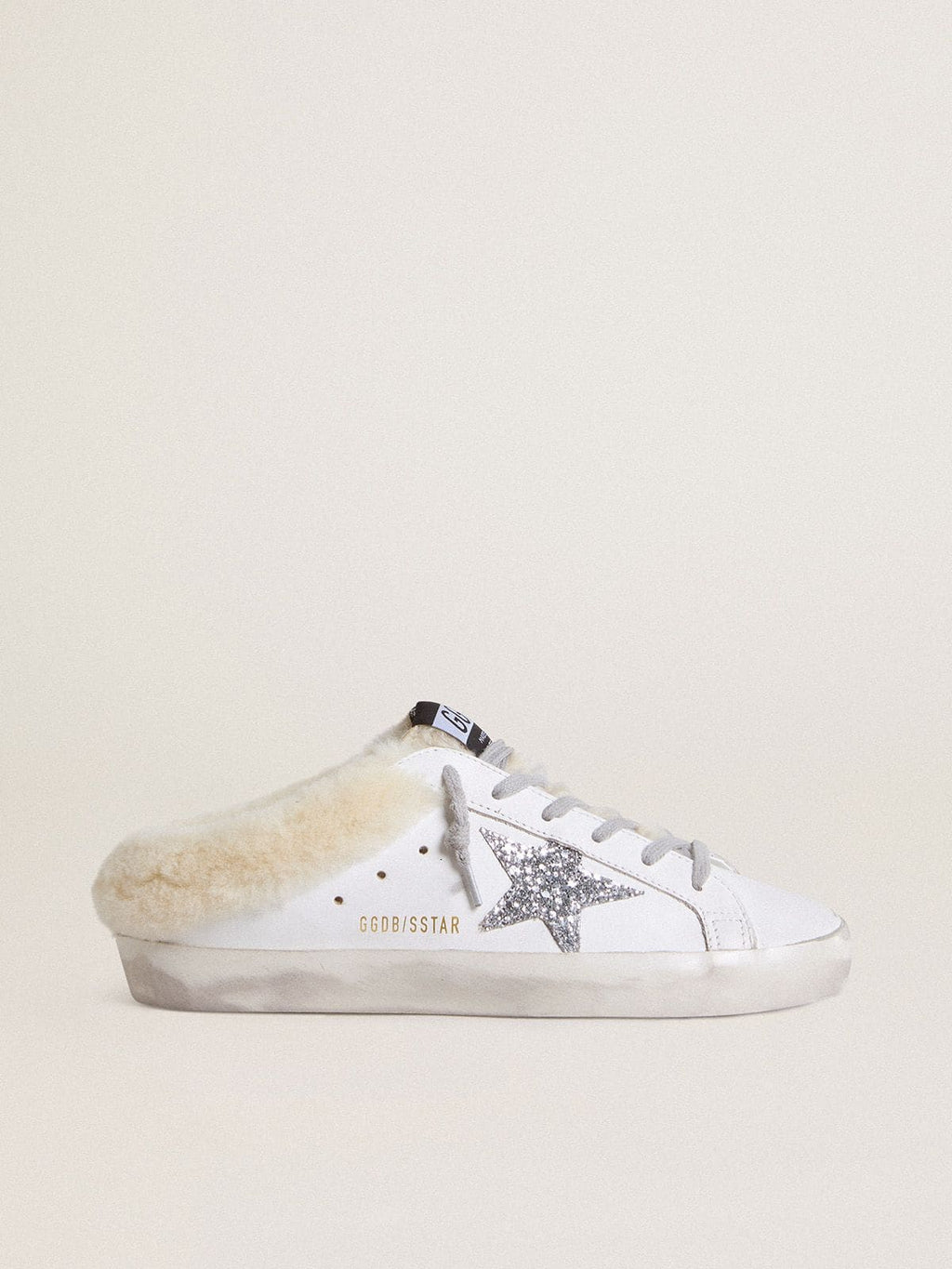 Super-Star Sabots in white leather with shearling lining and silver star