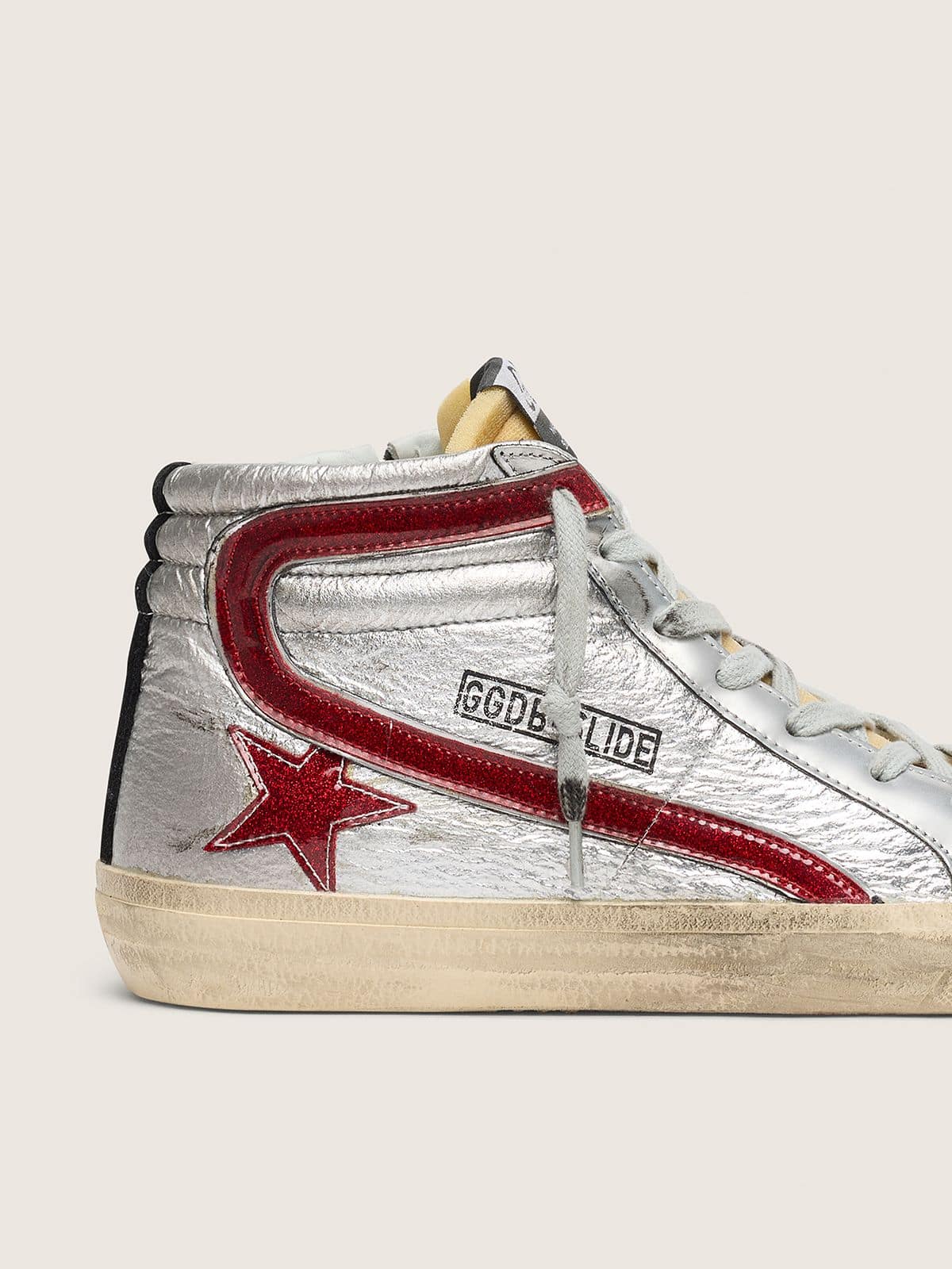 Women’s Slide with silver metallic leather upper and red metallic leather flash