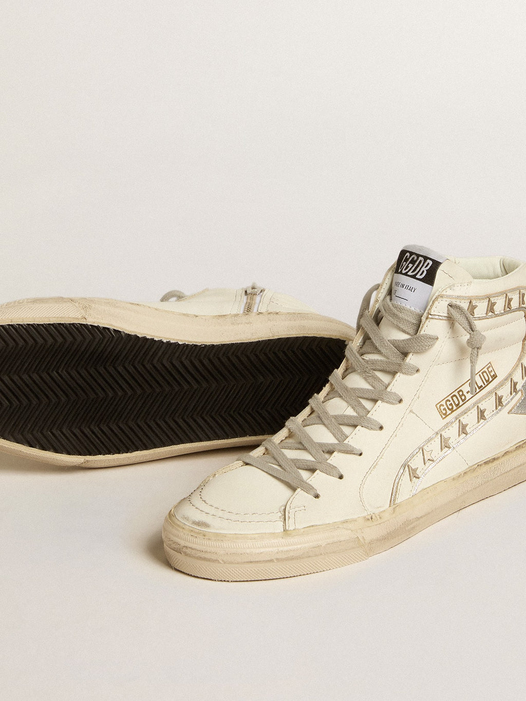 Slide with silver metallic leather star and leather flash with stars