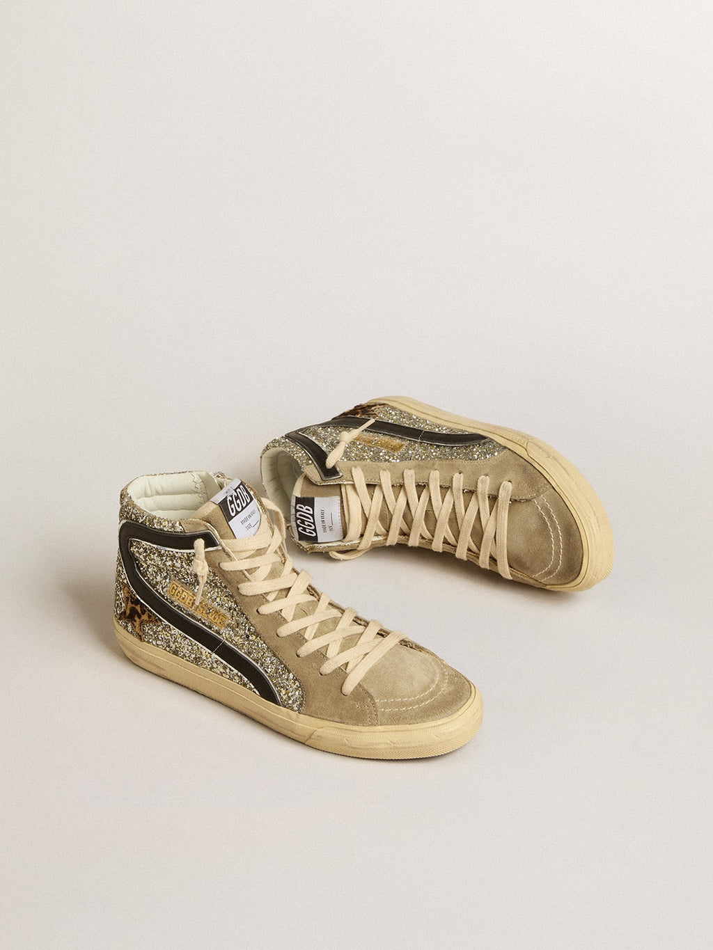 Slide in platinum glitter with leopard-print pony skin star and black flash