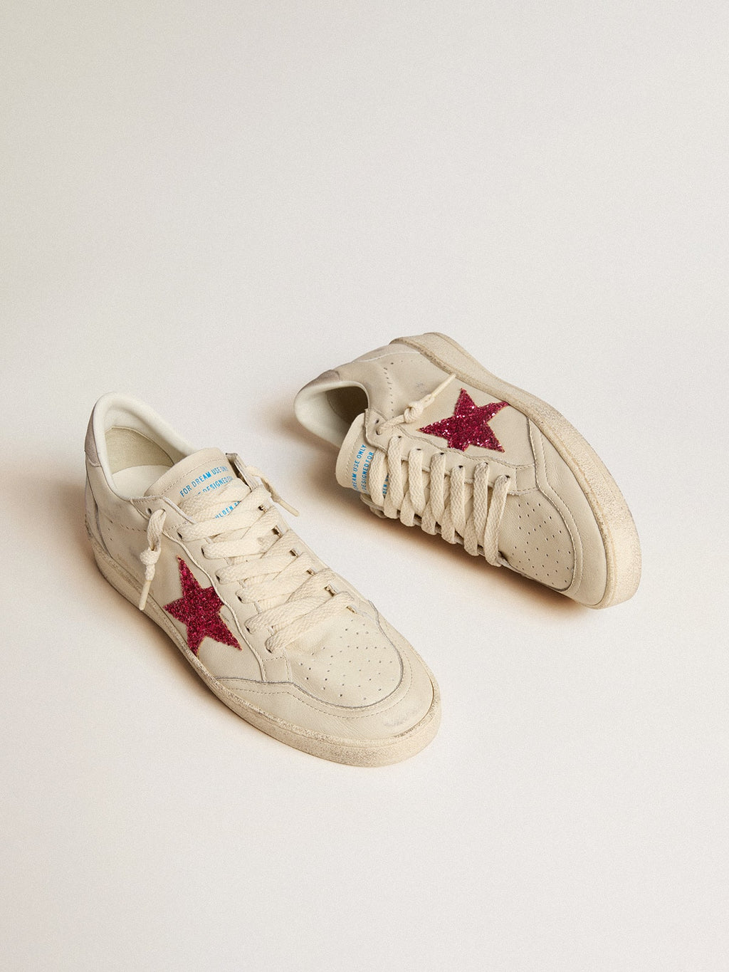 Ball Star LTD with fuchsia glitter star and light gray suede heel tab