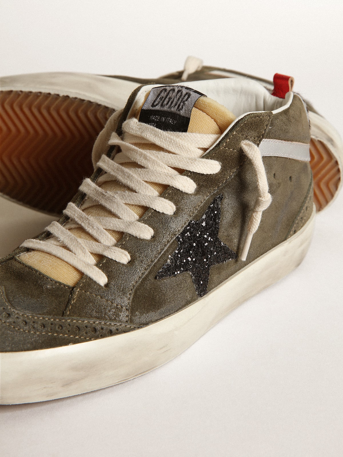 Women’s Mid-Star in olive-green suede with black glitter star and pony skin heel tab