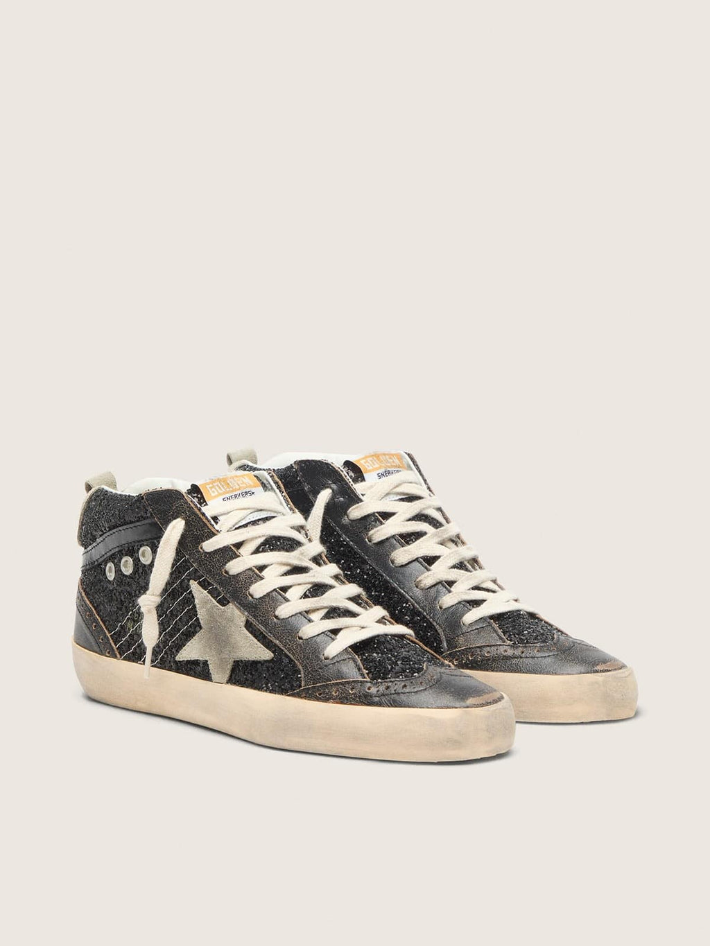 Women’s Mid Star in black glitter with dove-gray suede star and heel tab