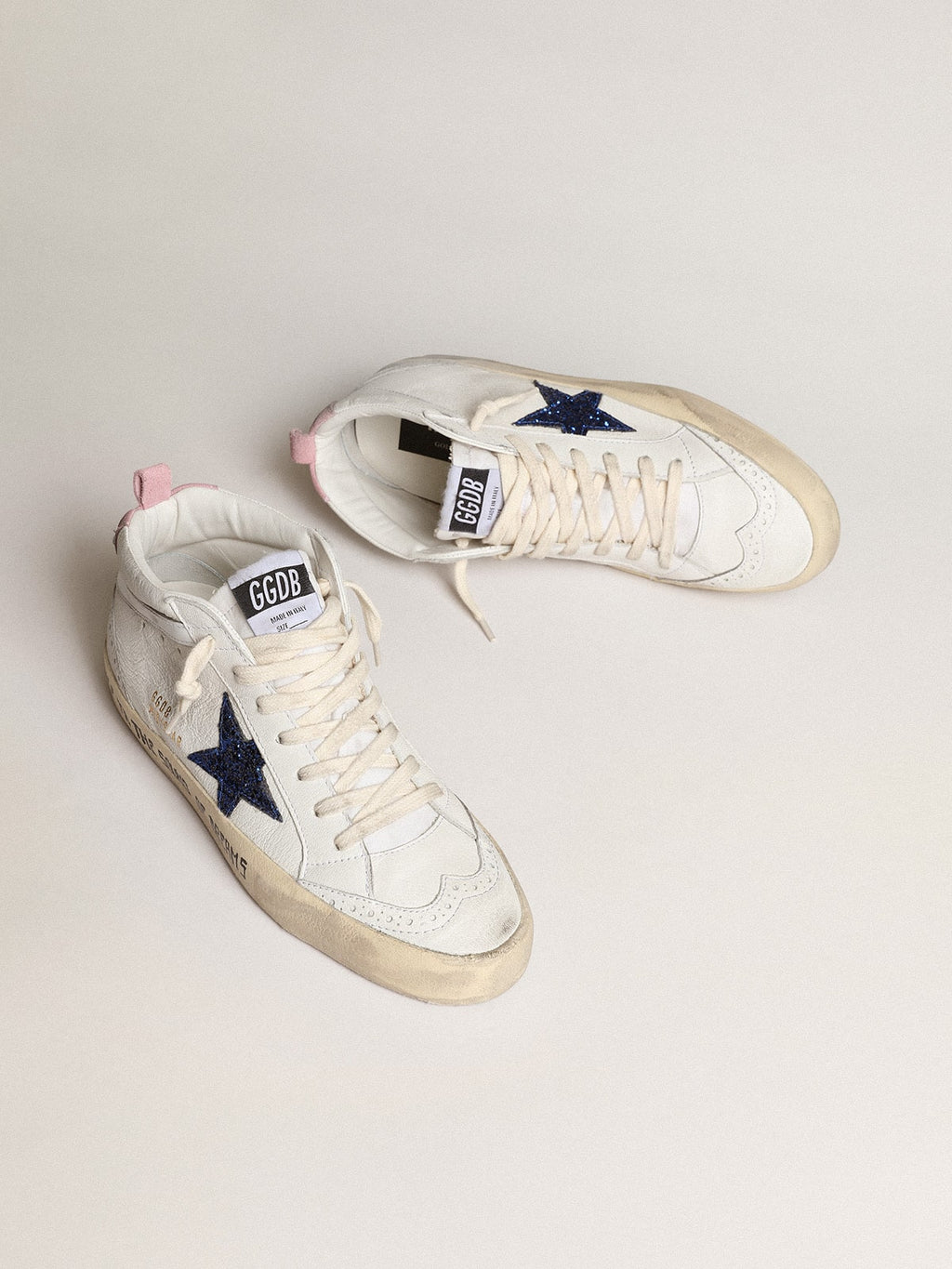 Mid Star with blue glitter star and pink suede heel tab