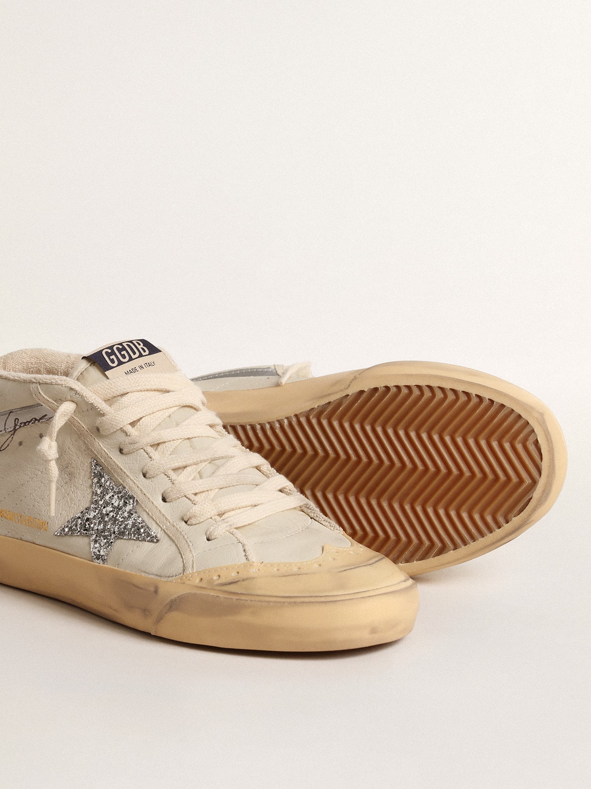 Mid Star LTD with glitter star and metallic leather flash