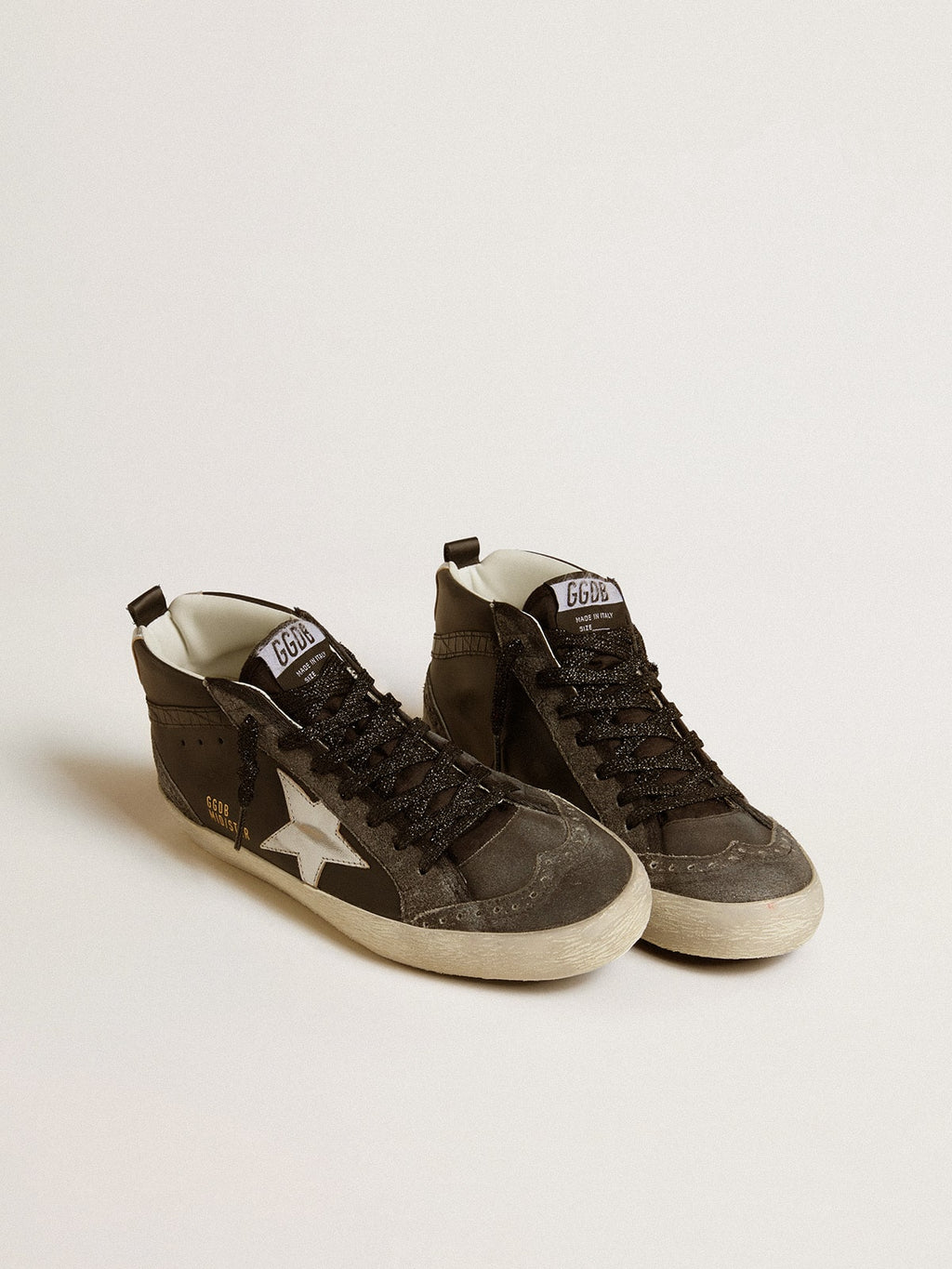 Women’s Mid Star in black leather with silver metallic leather star