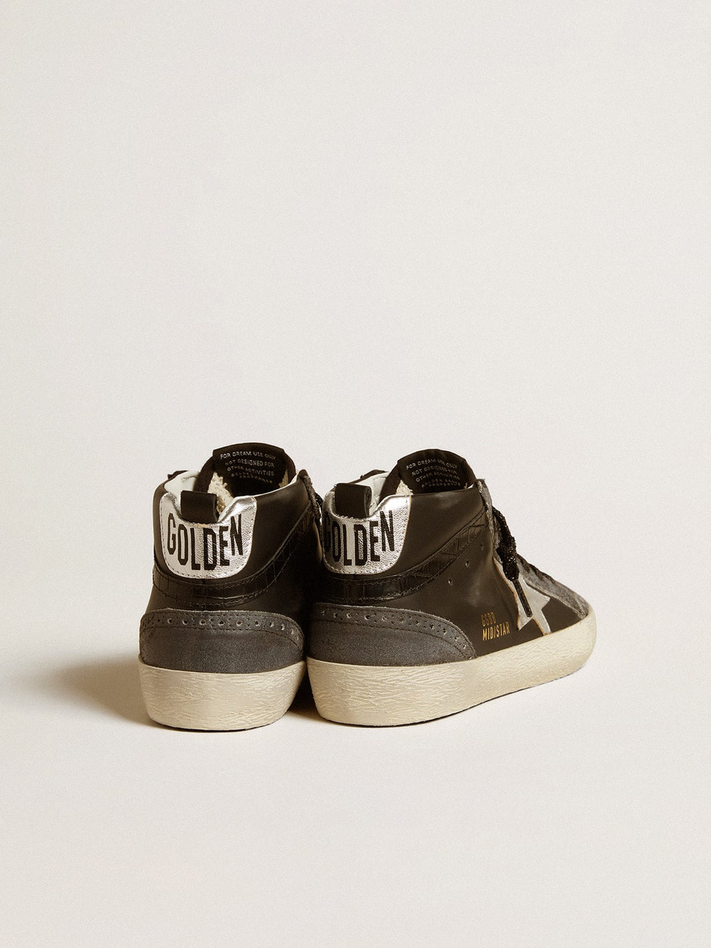 Women’s Mid Star in black leather with silver metallic leather star