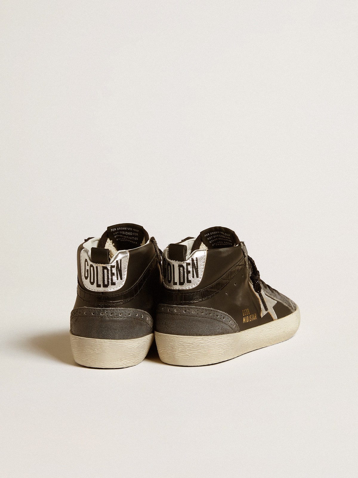 Women’s Mid Star in black leather with silver metallic leather star