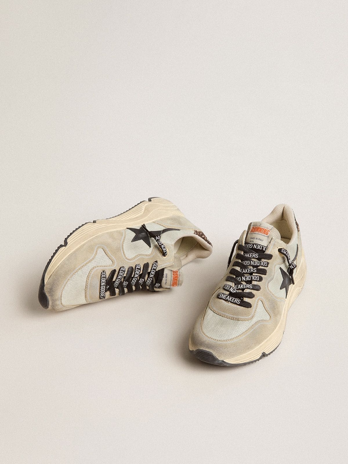 Women’s Running Sole in gray nylon with black star and glitter heel tab
