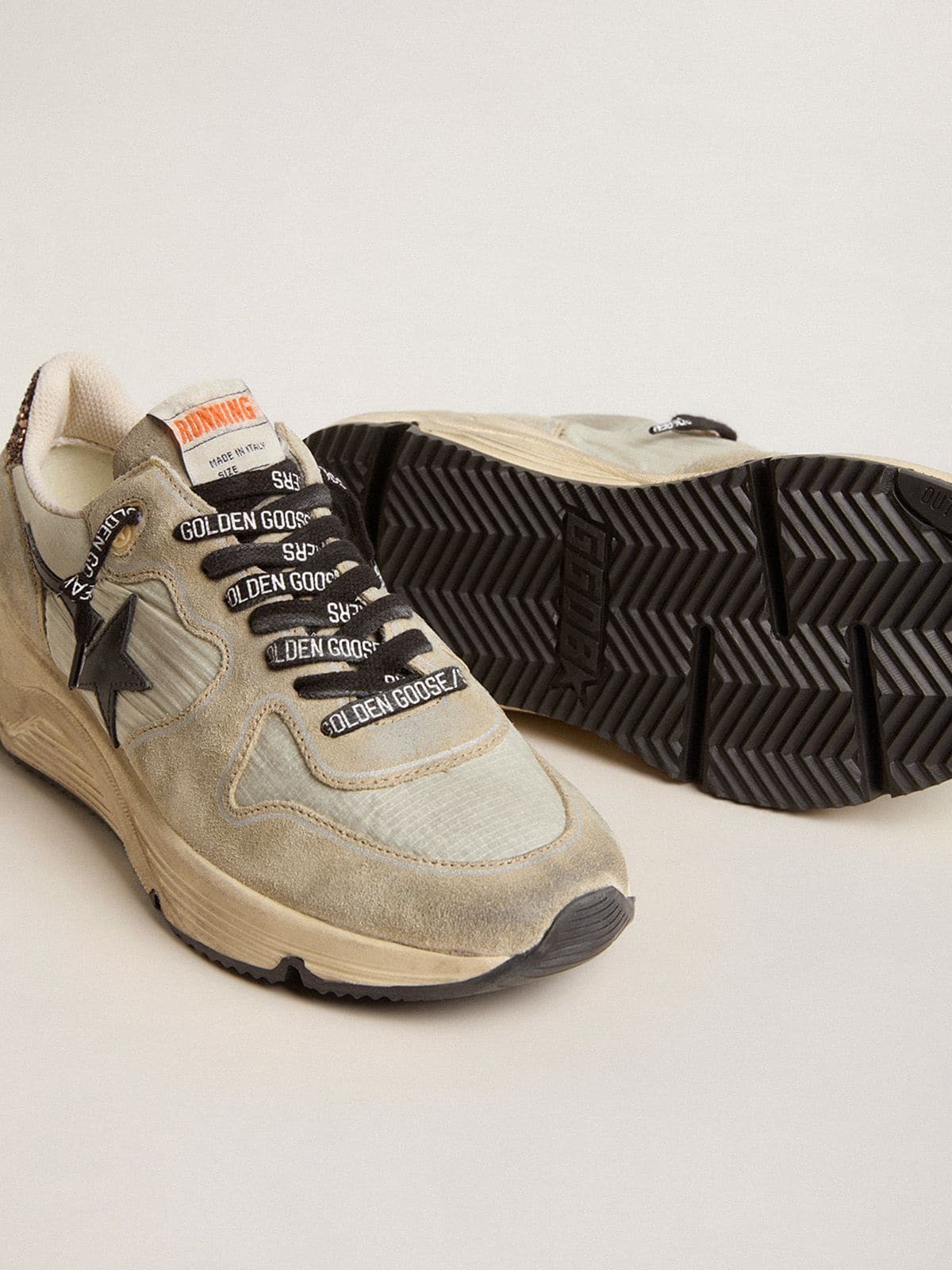 Women’s Running Sole in gray nylon with black star and glitter heel tab