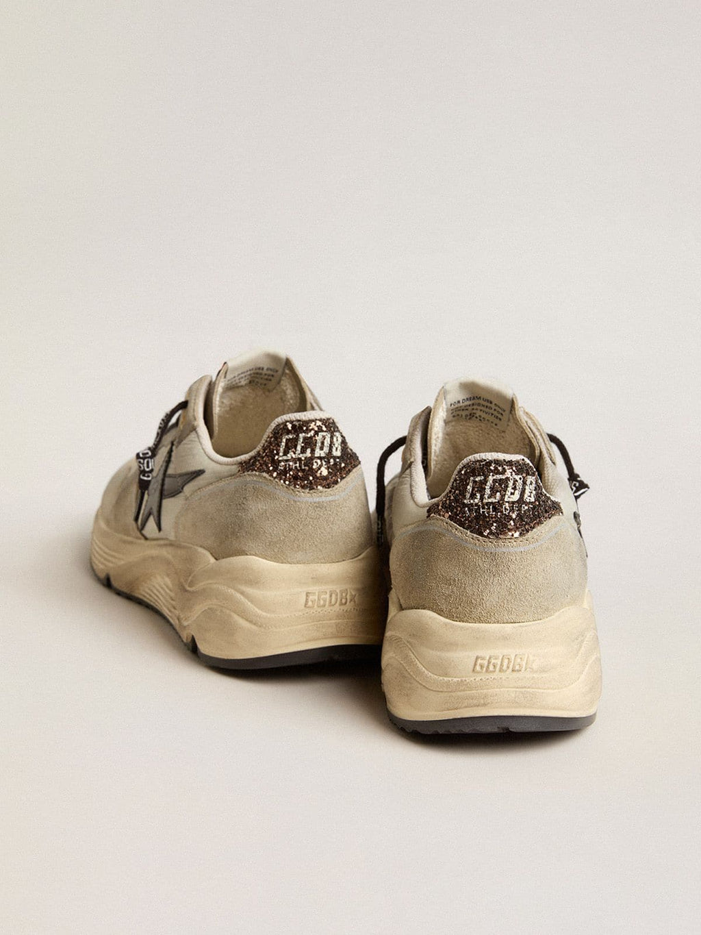 Women’s Running Sole in gray nylon with black star and glitter heel tab