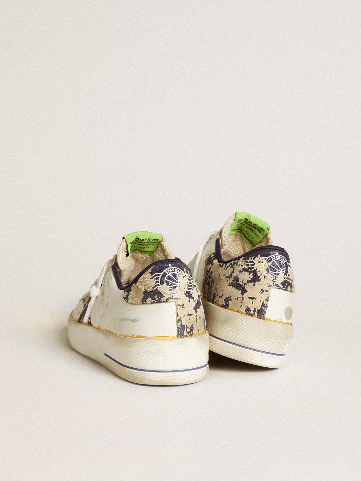 Women’s Stardan LAB in white leather with a camouflage star and heel tab
