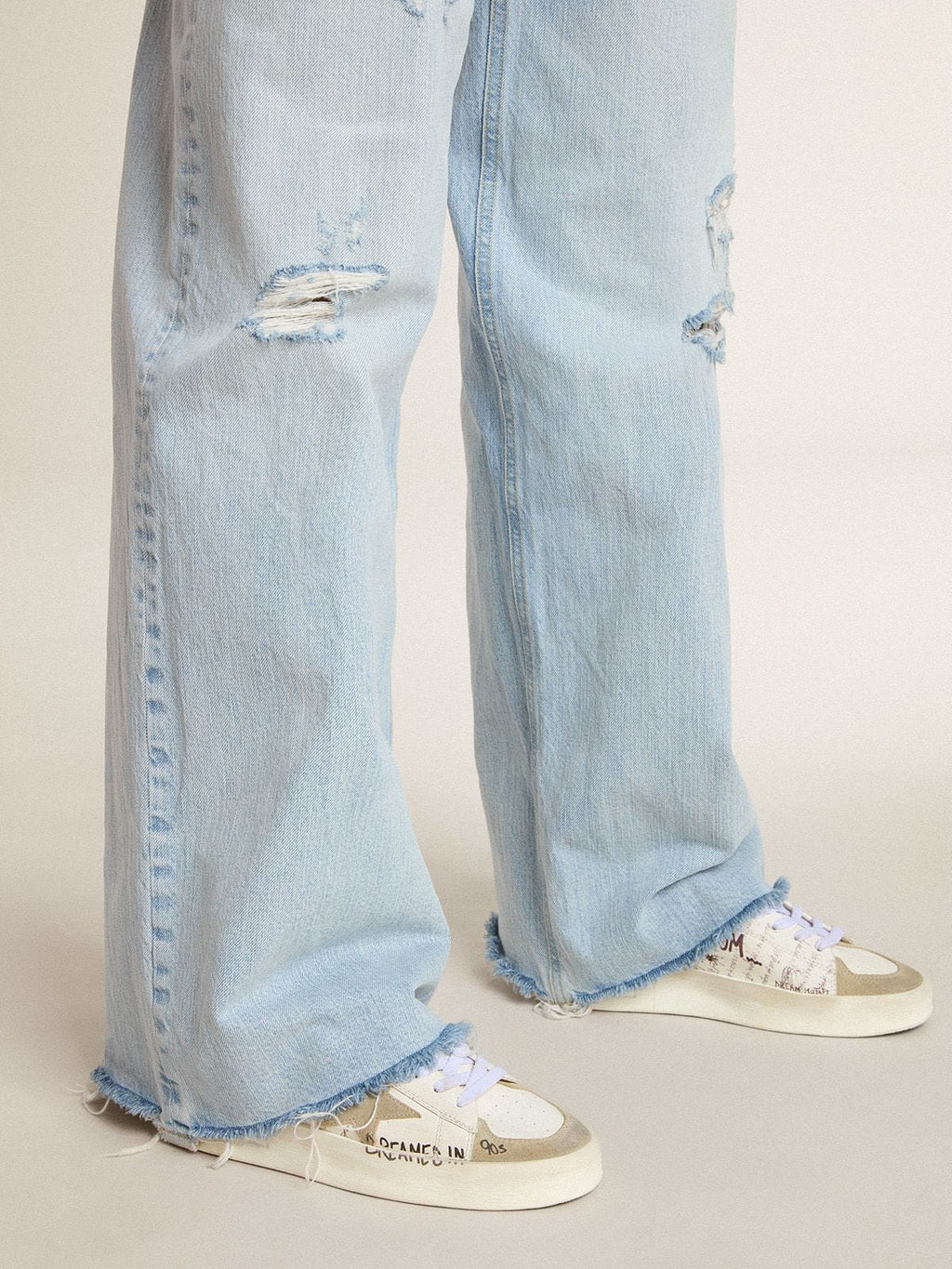 Stardan with beige suede star and toe and all-over lettering and patterns