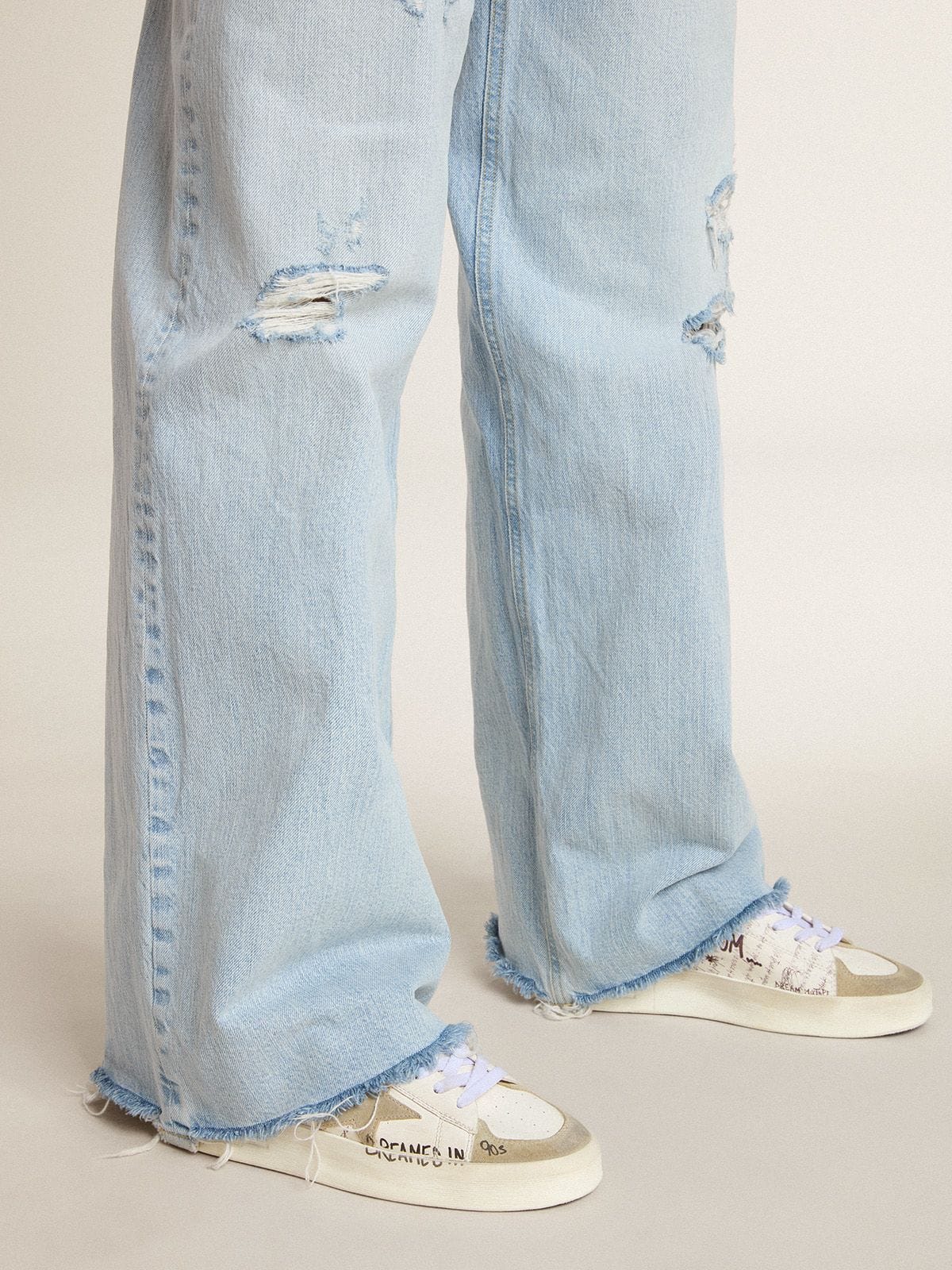 Stardan with beige suede star and toe and all-over lettering and patterns