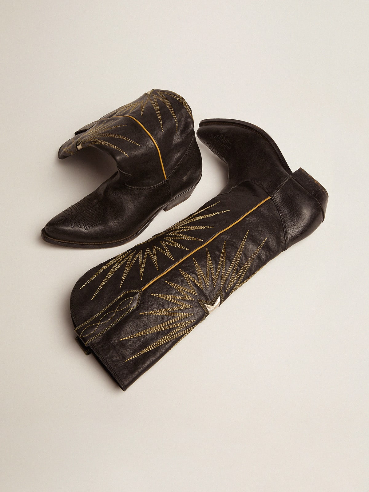 Wish Star boots in black leather with platinum laminated leather inlay star