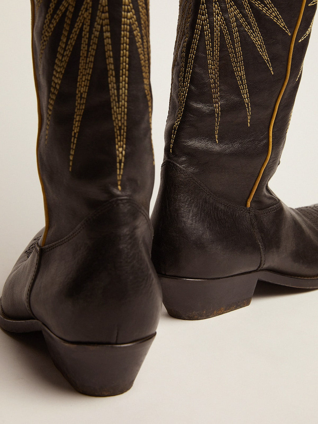 Wish Star boots in black leather with platinum laminated leather inlay star