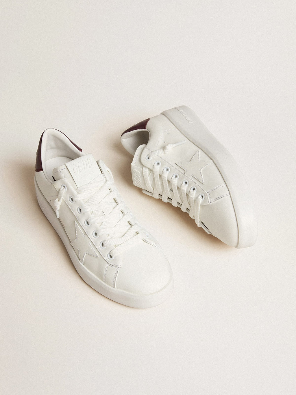 Purestar with white leather star and plum leather heel tab