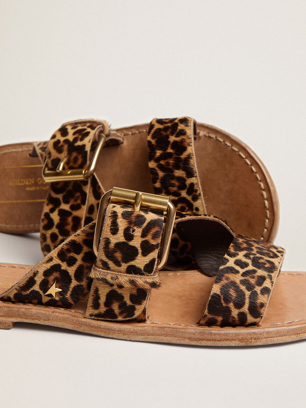 Margaret flat sandals in leopard-print pony skin