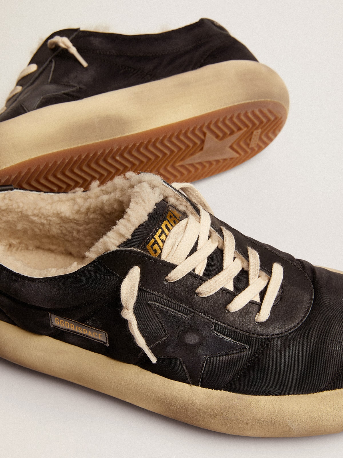 Women's Space-Star shoes in quilted black nylon with shearling lining