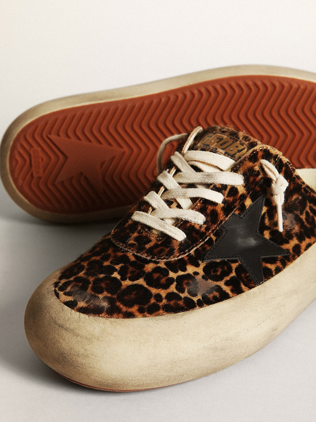 Women's Space-Star Sabot in leopard print pony skin with black star