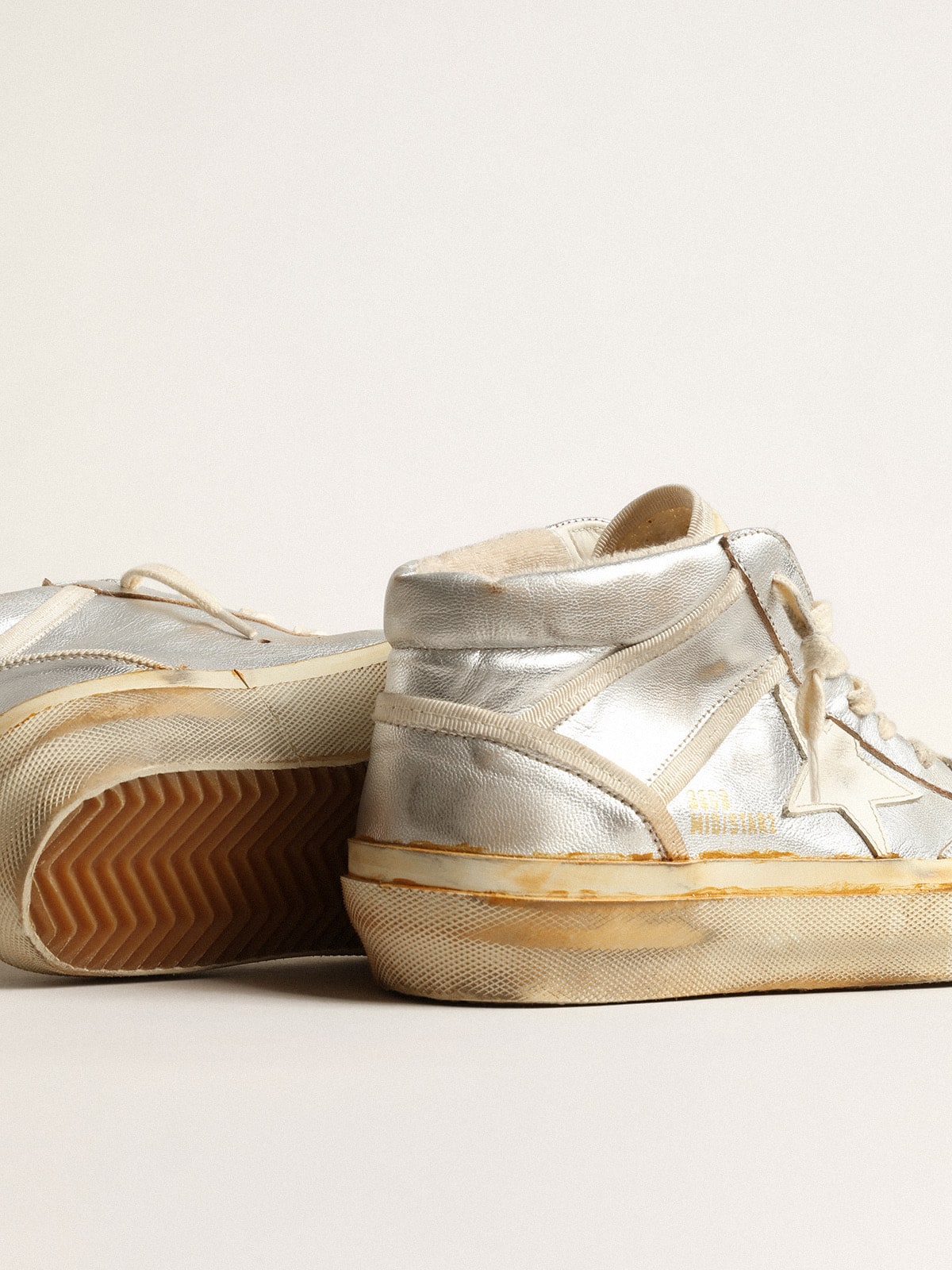 Women’s Mid Star in silver metallic leather with ivory star