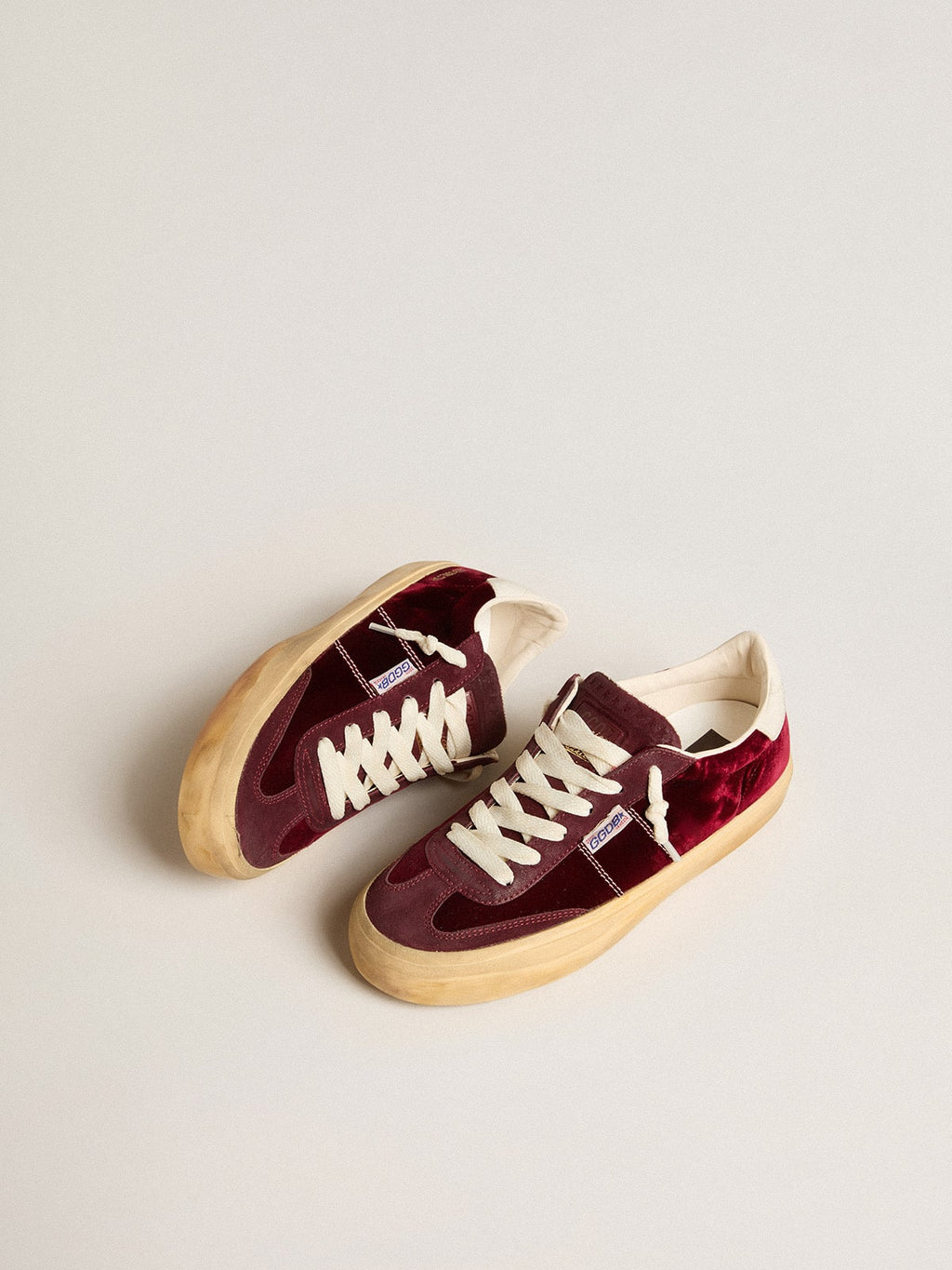 Soul Star in burgundy velvet with white leather heel tab
