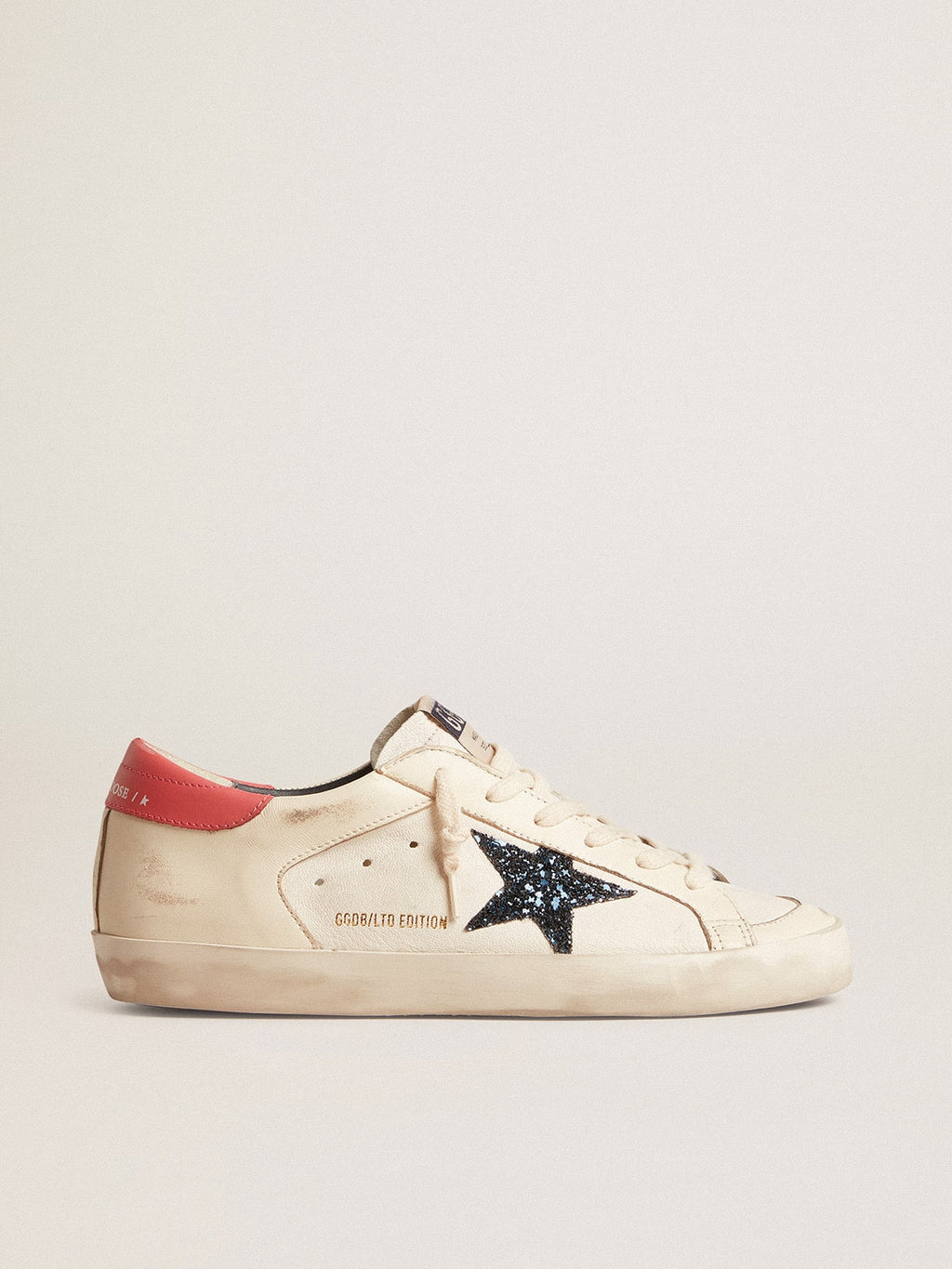Women's Super-Star LTD in nappa with blue glitter star and red heel tab