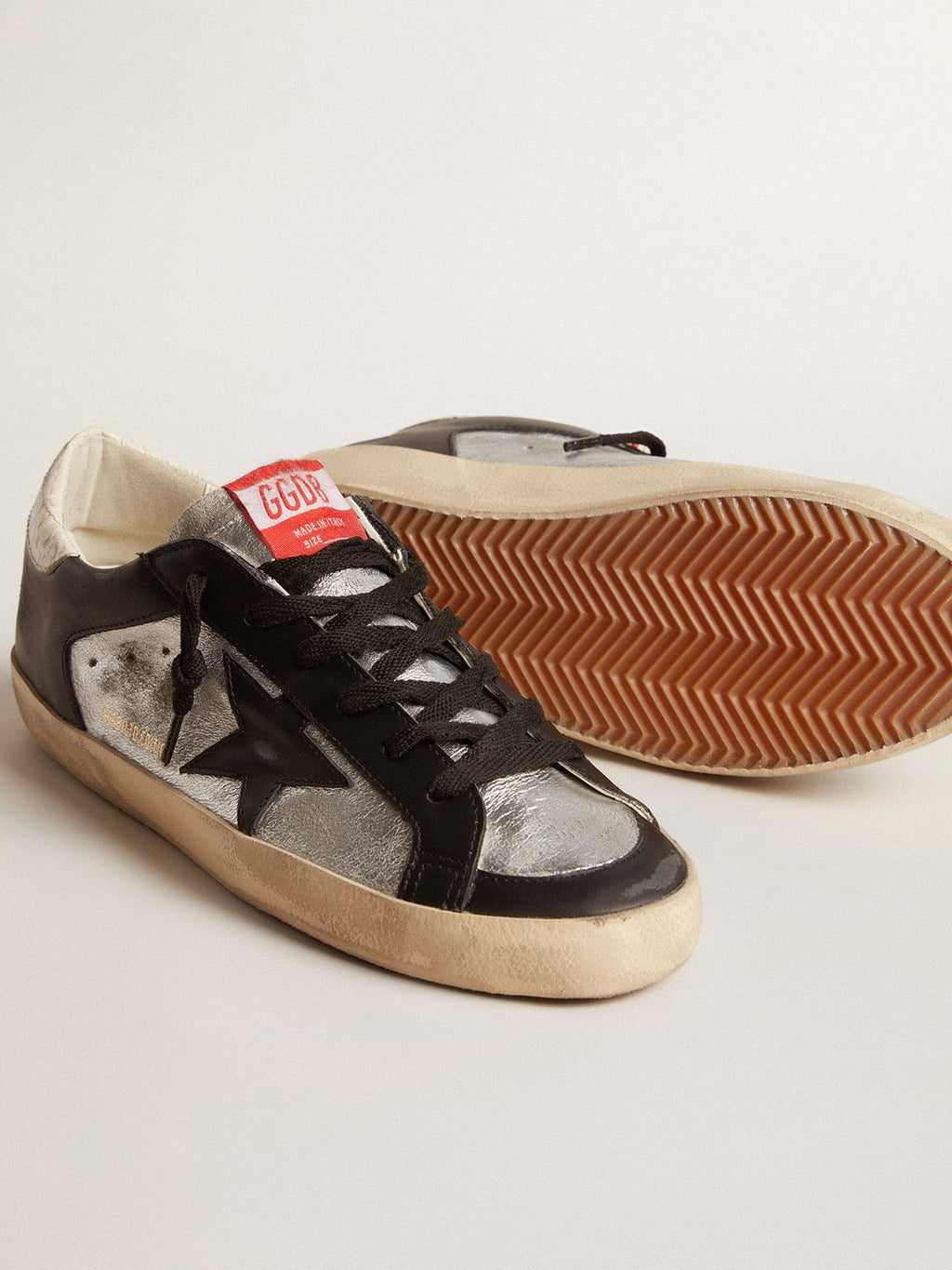 Super-Star LTD in metallic leather with black leather star and inserts