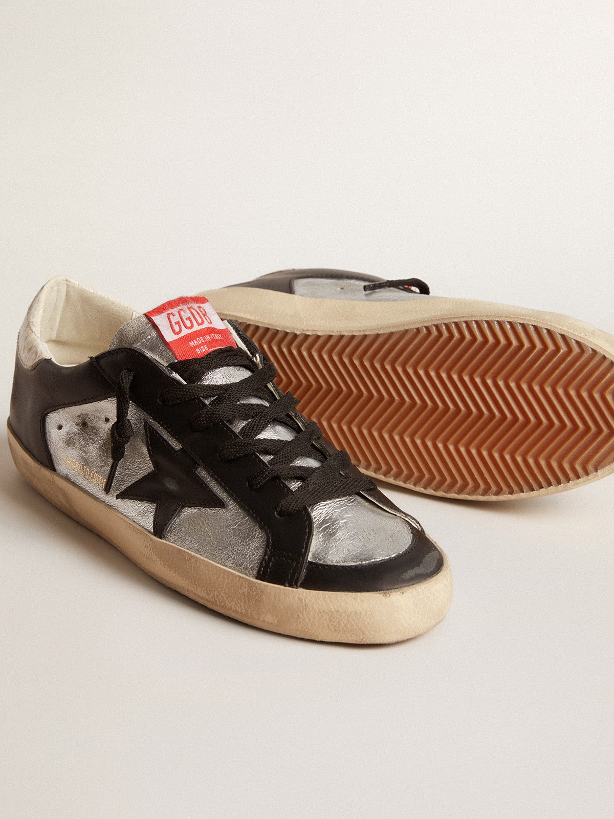 Super-Star LTD in metallic leather with black leather star and inserts