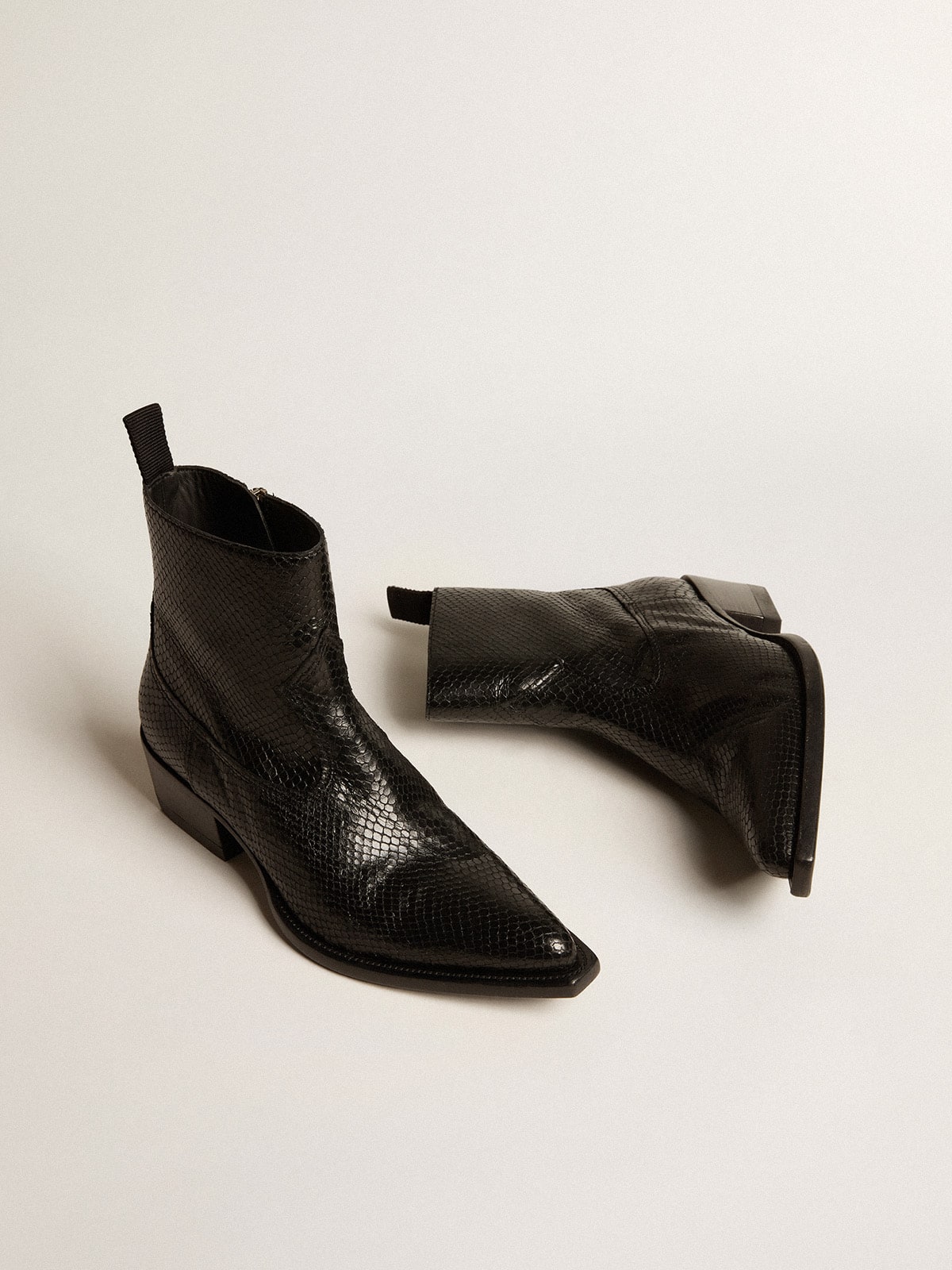 Low Debbie boots in black snake-print leather