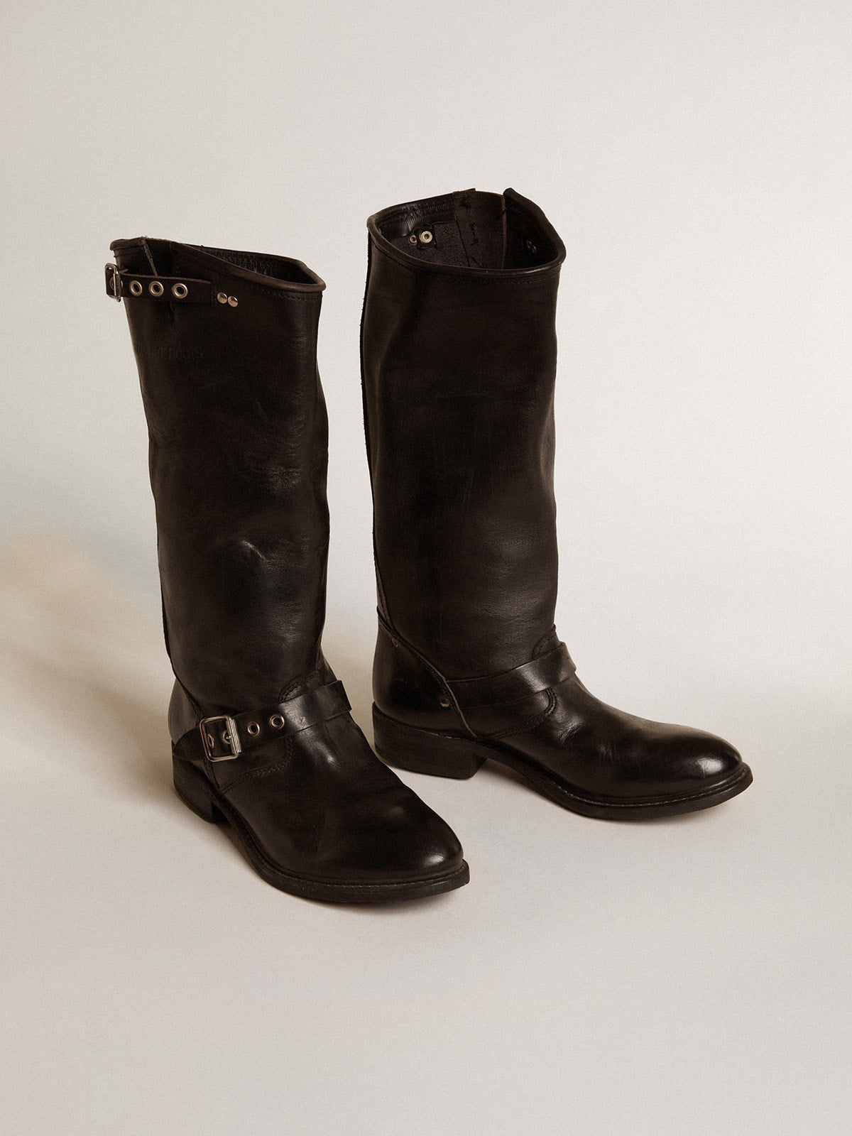 High Biker boots in black leather with silver studs and buckles