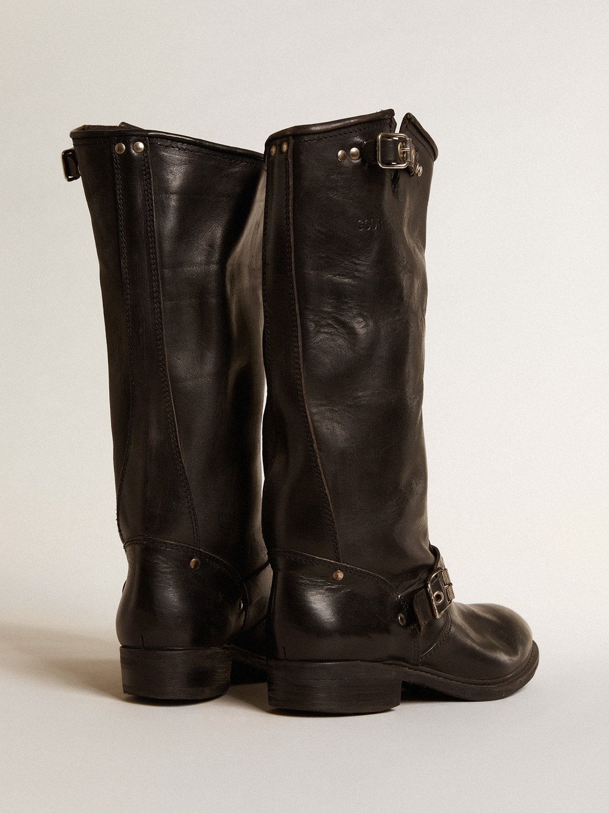 High Biker boots in black leather with silver studs and buckles
