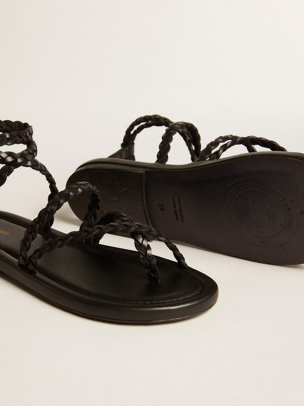 Penelope flat sandals in black leather