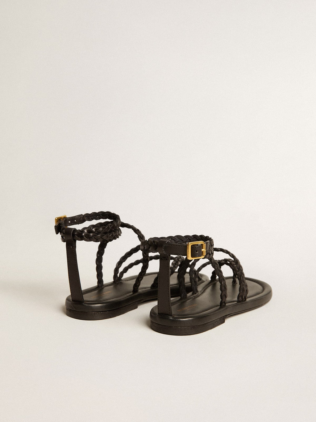 Penelope flat sandals in black leather