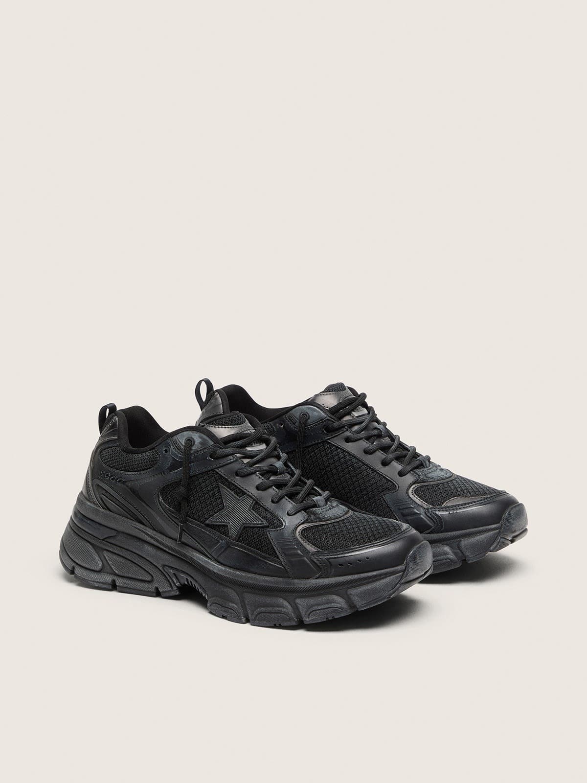 Women’s Lightstar with black leather and mesh upper and black star