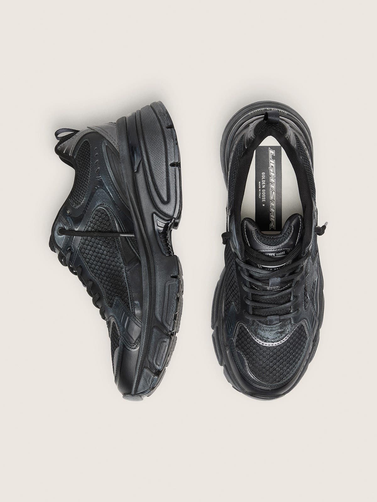 Women’s Lightstar with black leather and mesh upper and black star