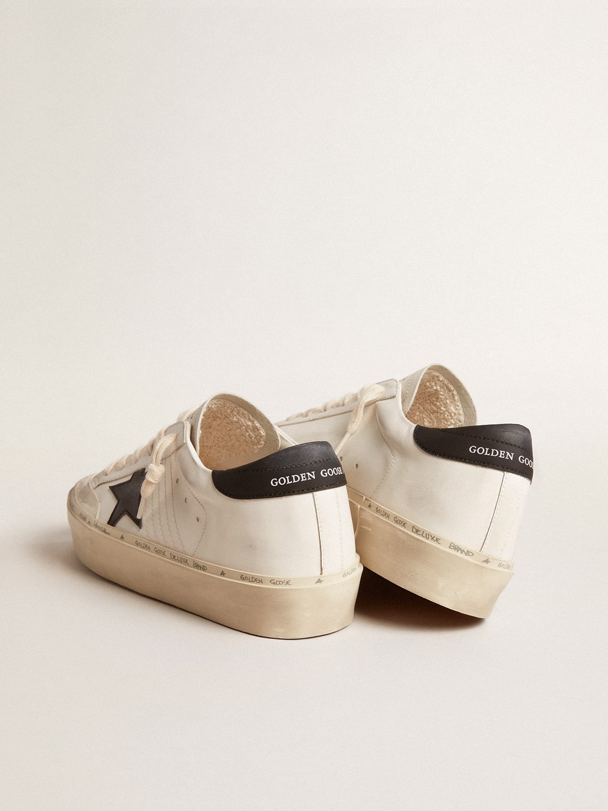 Woman's white bio-based Hi Star LTD with black bio-based star and heel tab