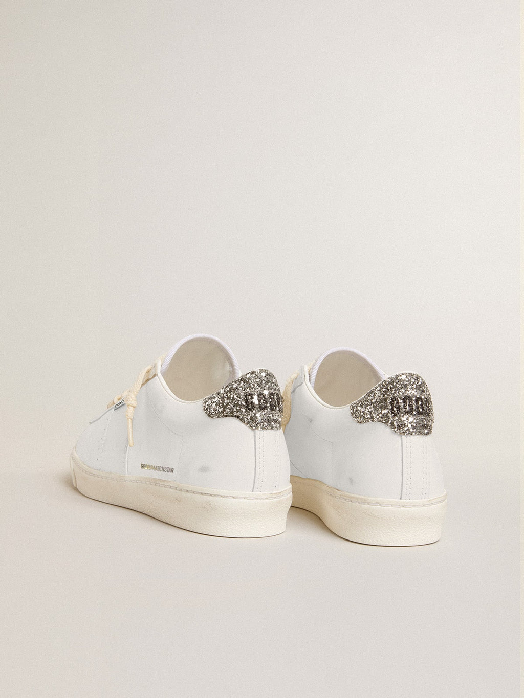 Matchstar in white leather with silver glitter heel tab