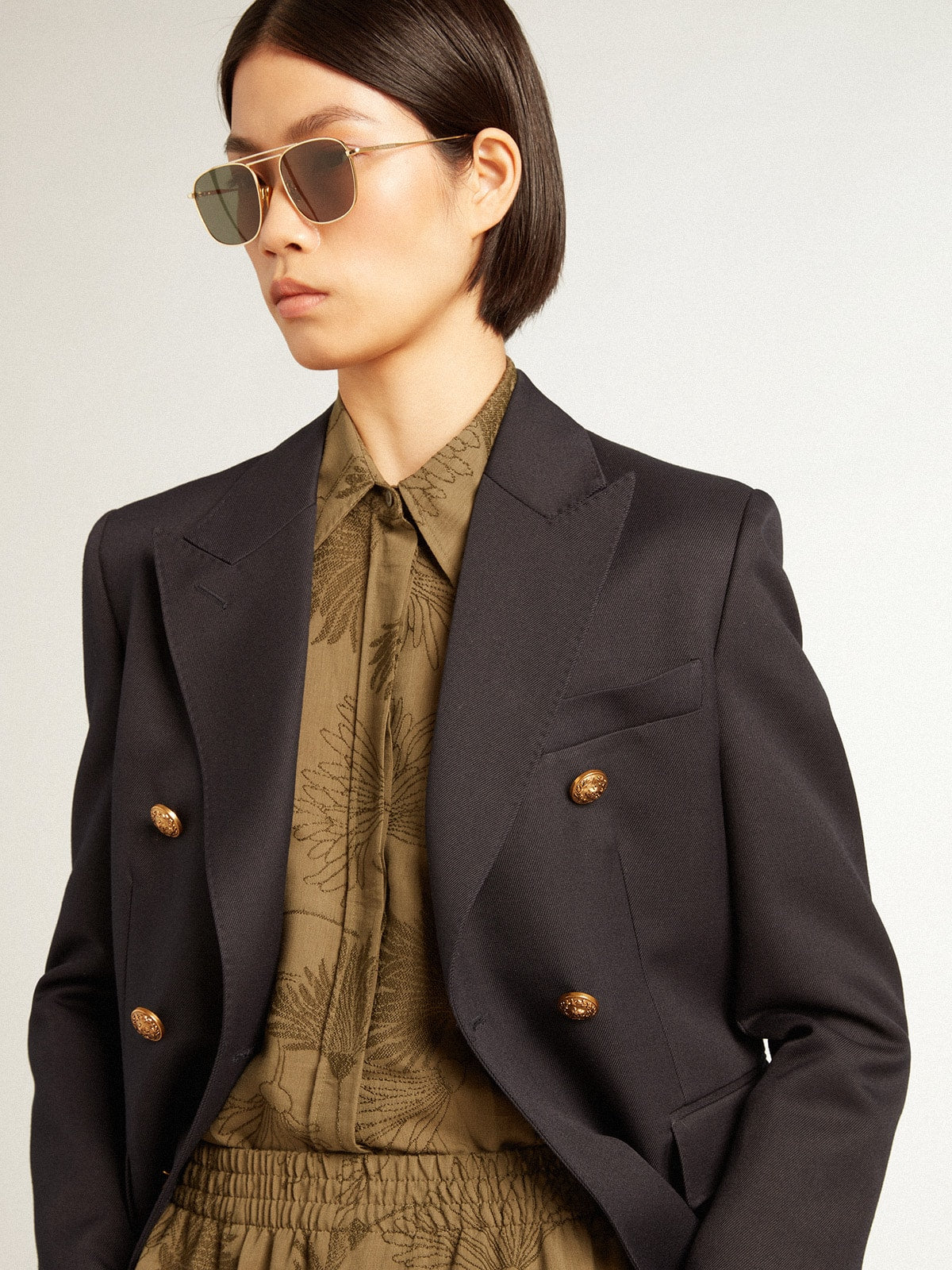 Women's olive-colored viscose-cotton blend shirt with floral pattern
