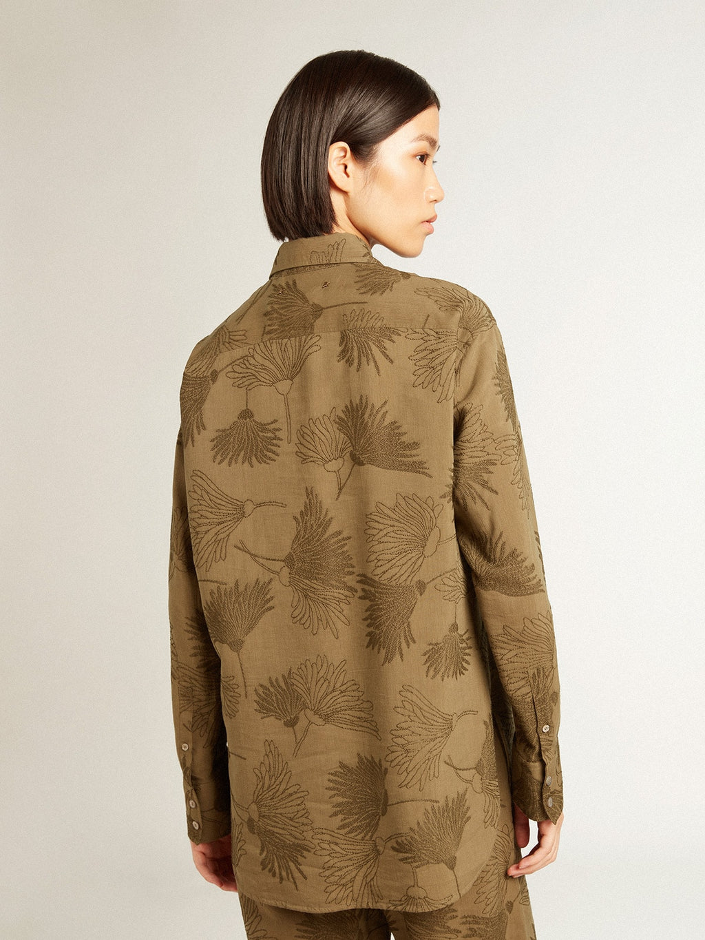 Women's olive-colored viscose-cotton blend shirt with floral pattern