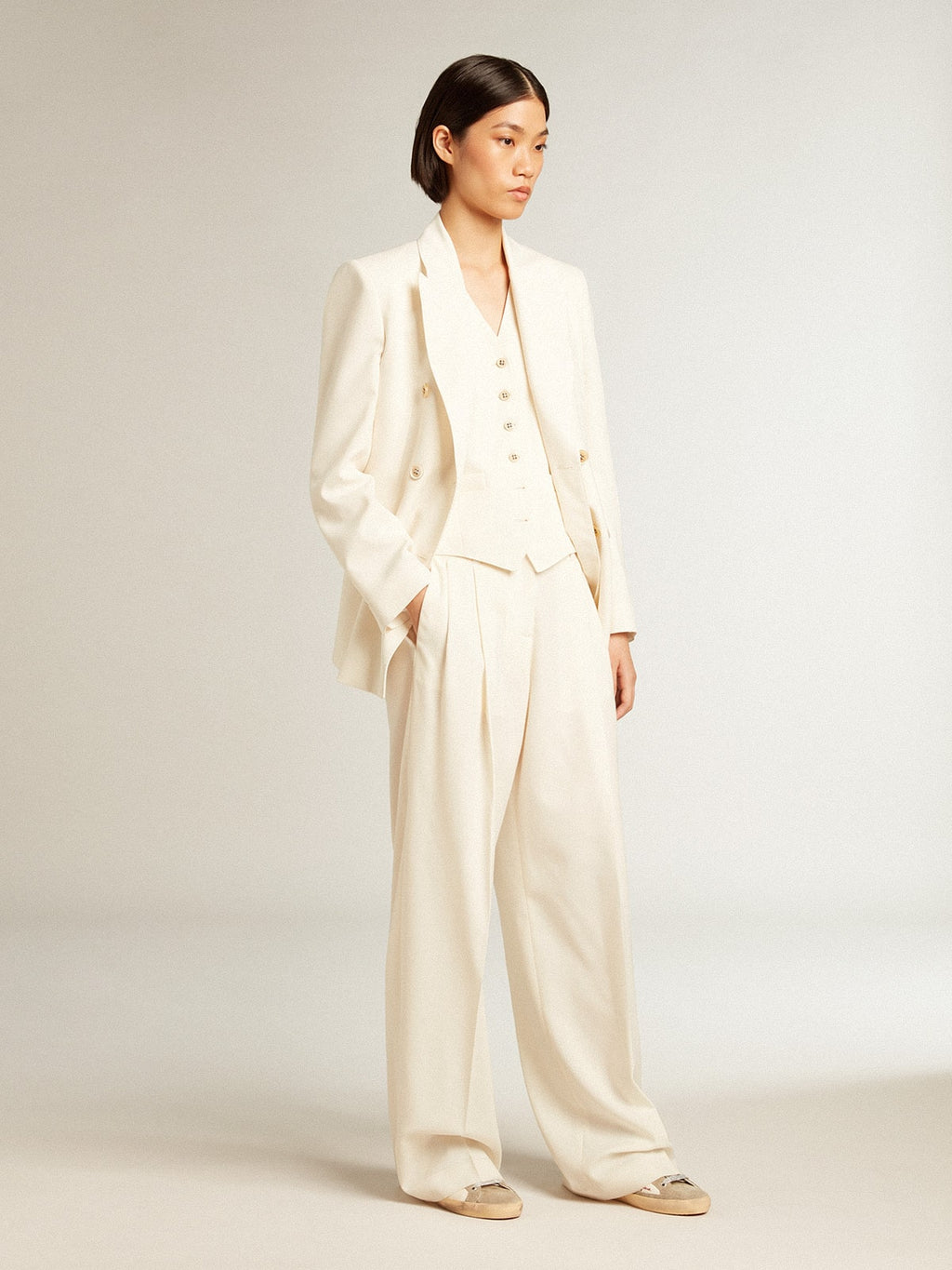 Women’s aged white double-breasted blazer