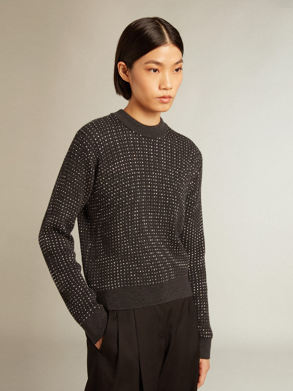 Round-neck sweater in merino wool with all-over crystals