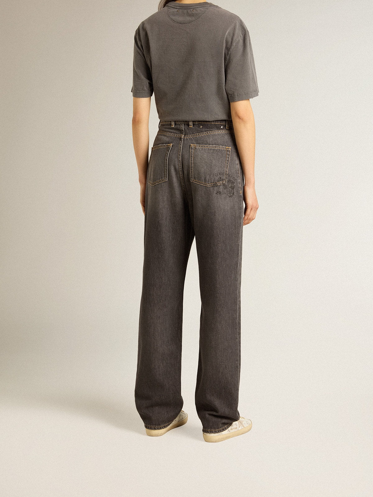 Women’s black jeans with printed pocket
