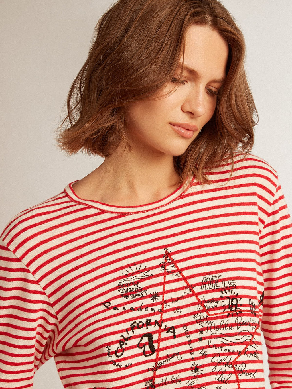 Women's T-shirt with white and red stripes and embroidery on the front