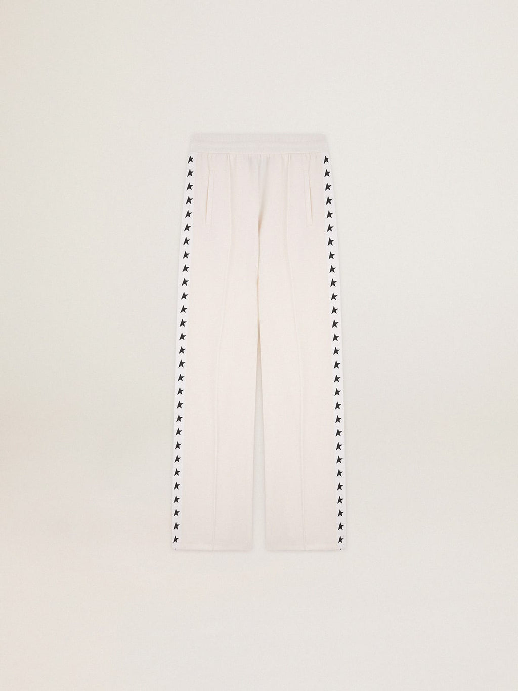 Women’s white joggers with stars on the sides