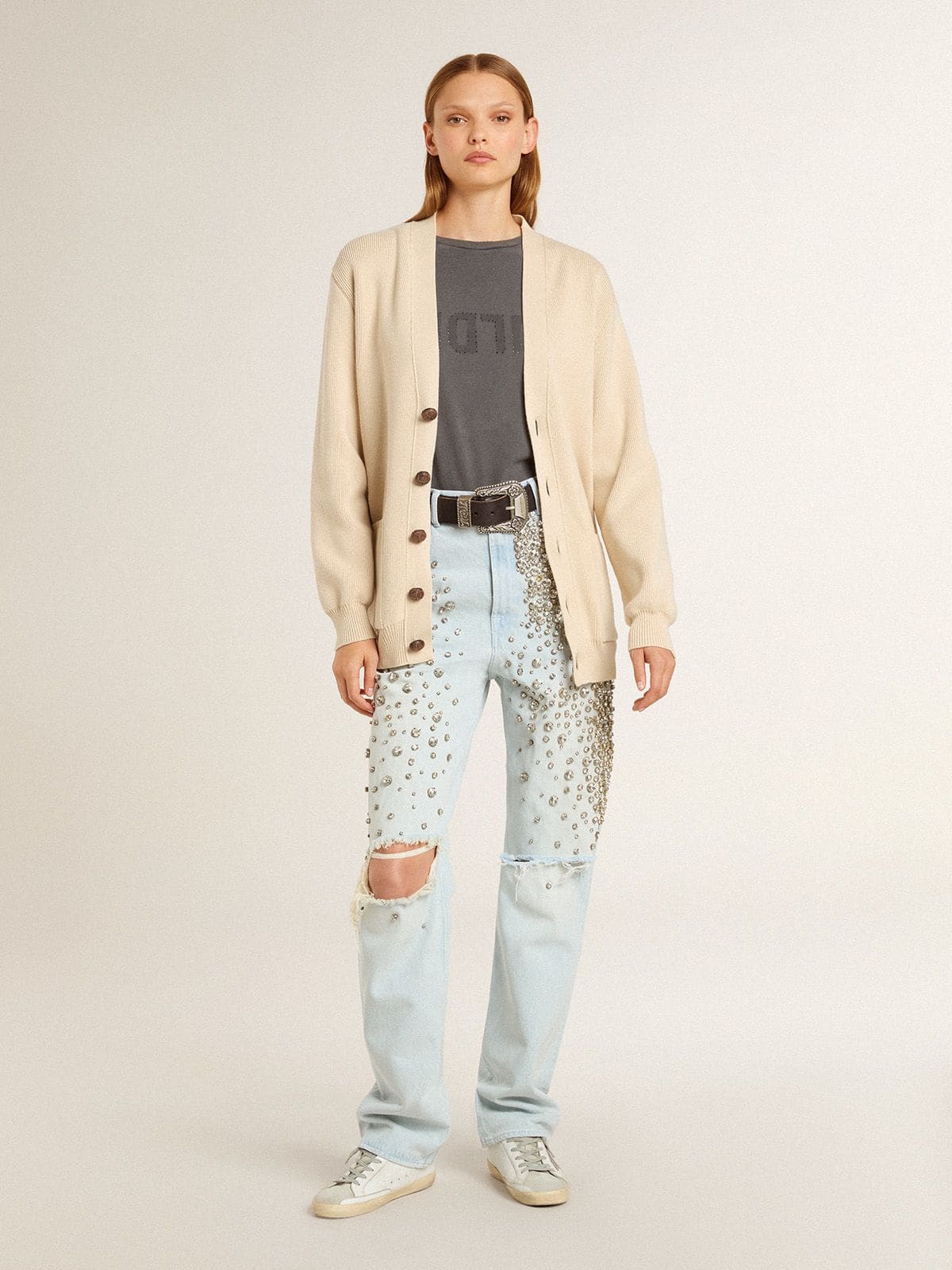 Women’s beige cardigan with 'Golden' lettering on the back