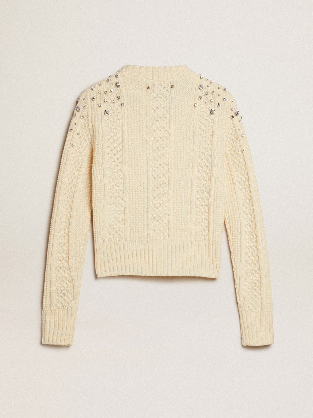 Women's cropped worn-white sweater with decorative crystals