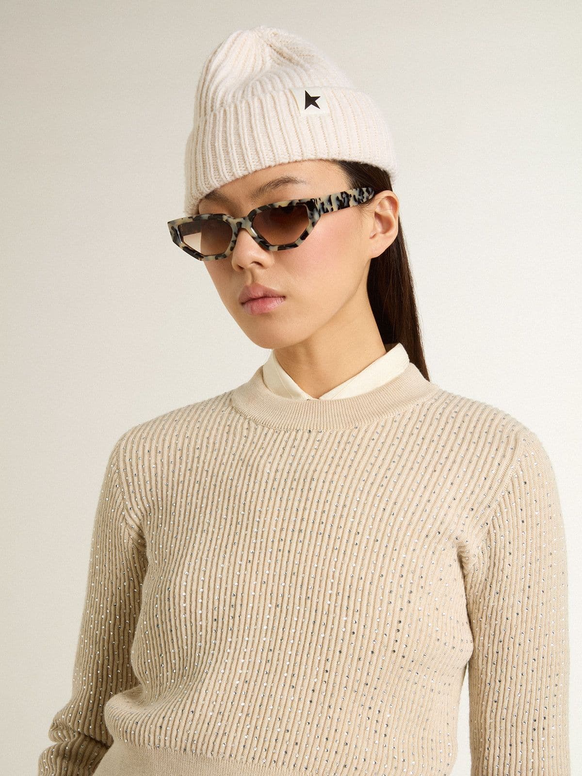 Cropped round-neck sweater in beige wool with all-over crystals