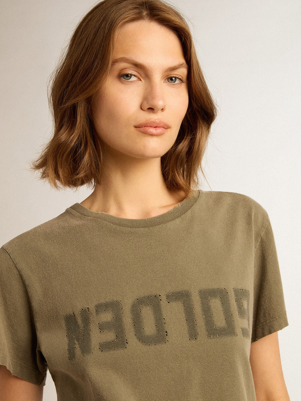 Women's olive green T-shirt with Golden lettering