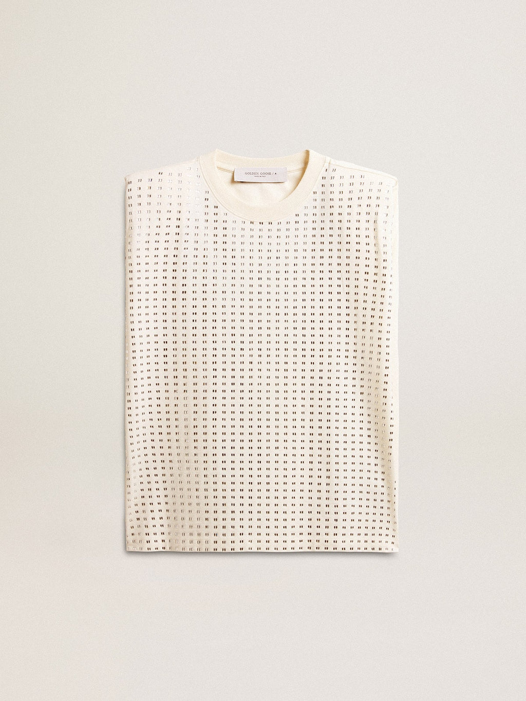 Aged white sleeveless T-shirt embellished with crystals